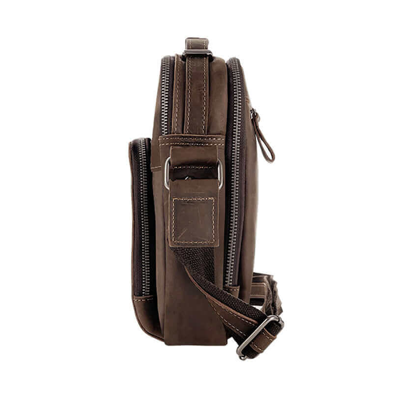 Side view of the men's vintage brown leather crossbody bag showing multiple zipper pockets.