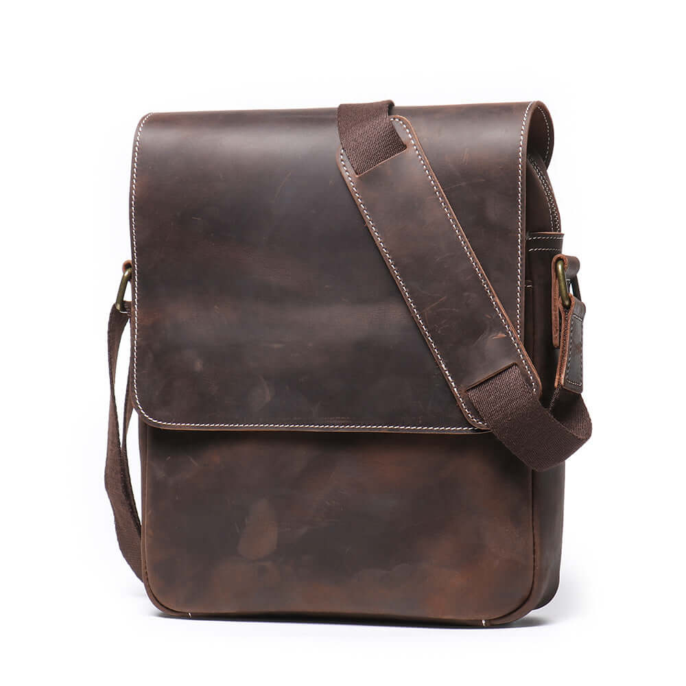 Angled view of vintage leather crossbody bag for men