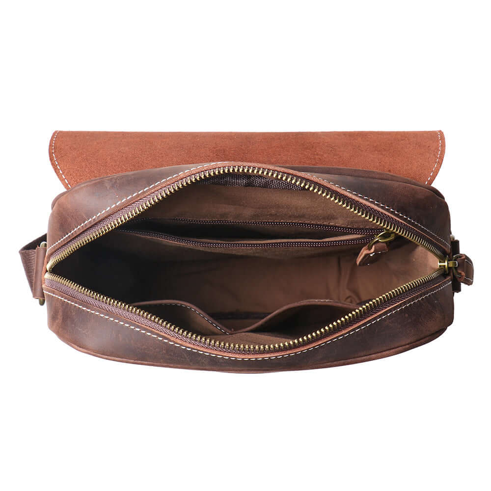 Open view showing compartments of leather shoulder bag