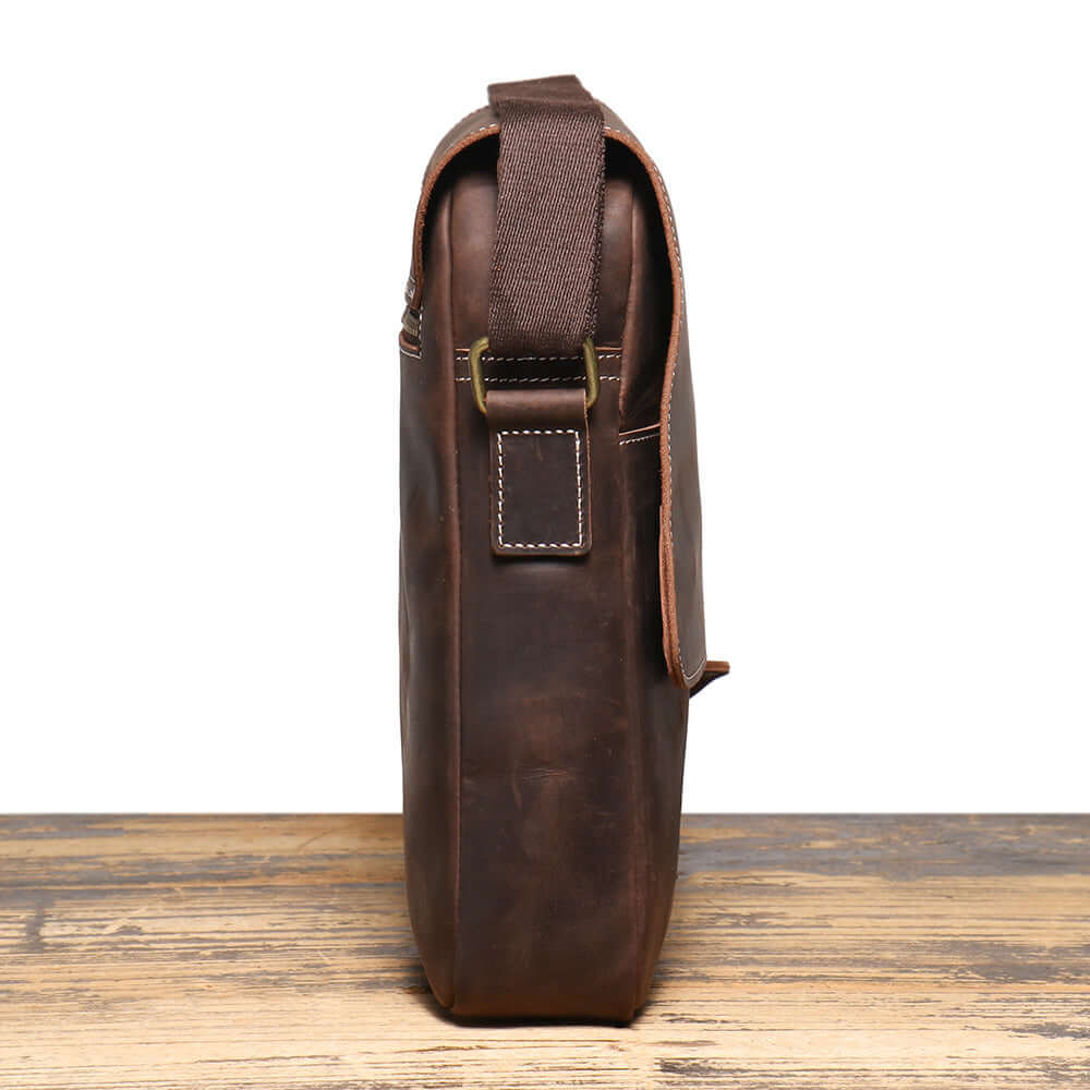 Side view of dark brown men’s leather crossbody shoulder bag