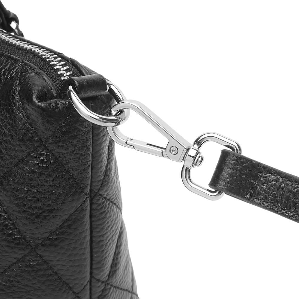 Strap attachment and metal clasp detail