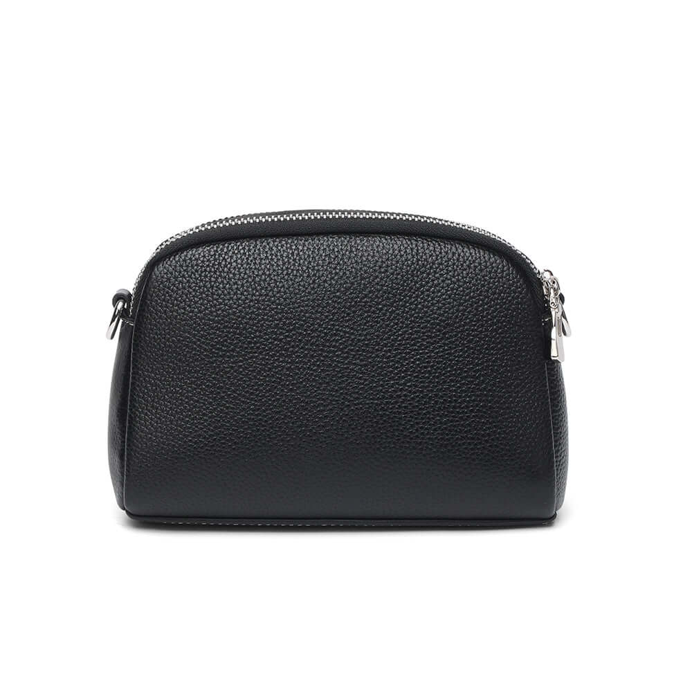 Back view of the black mini leather crossbody bag.