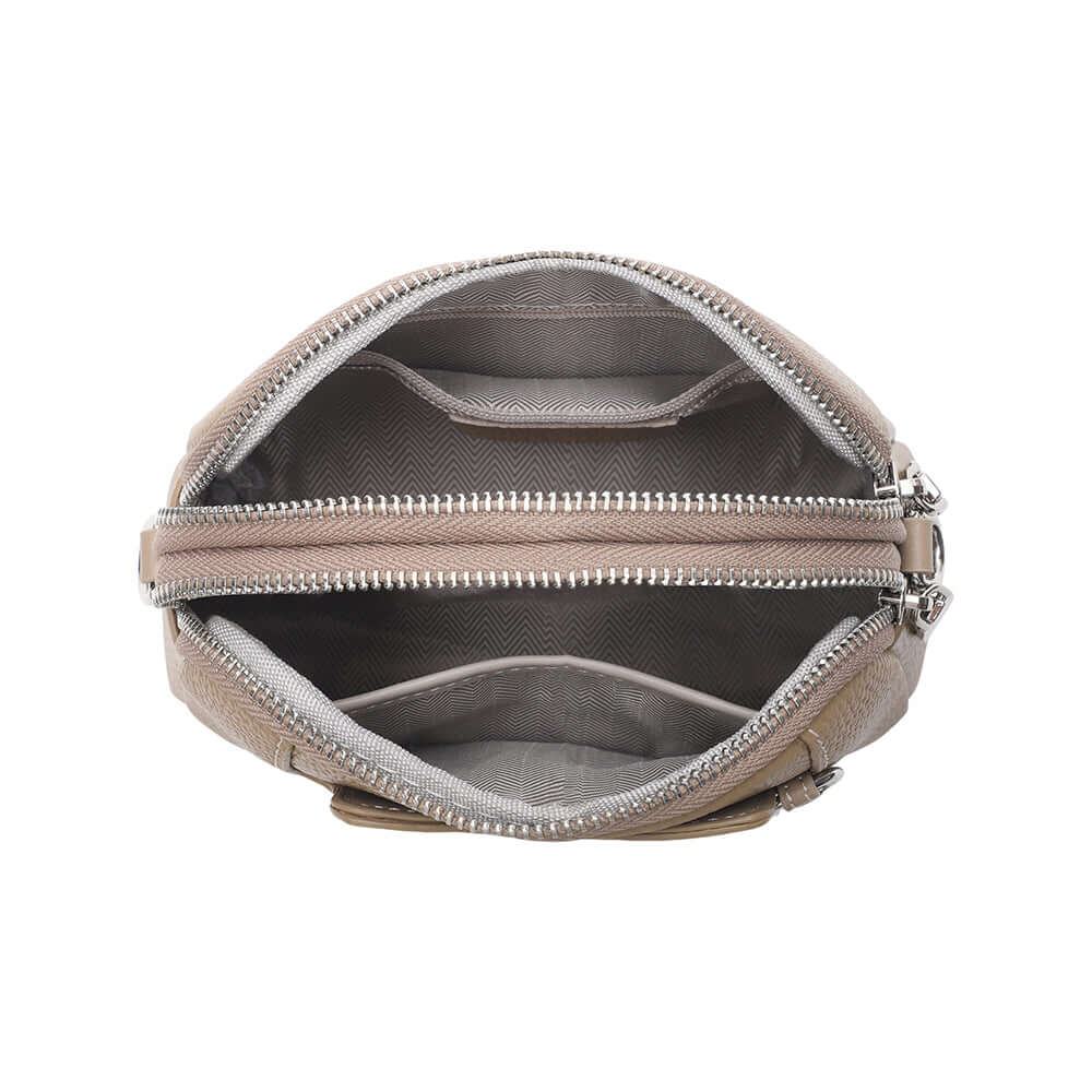 Mini leather crossbody bag opened to show wide easy-access compartments.