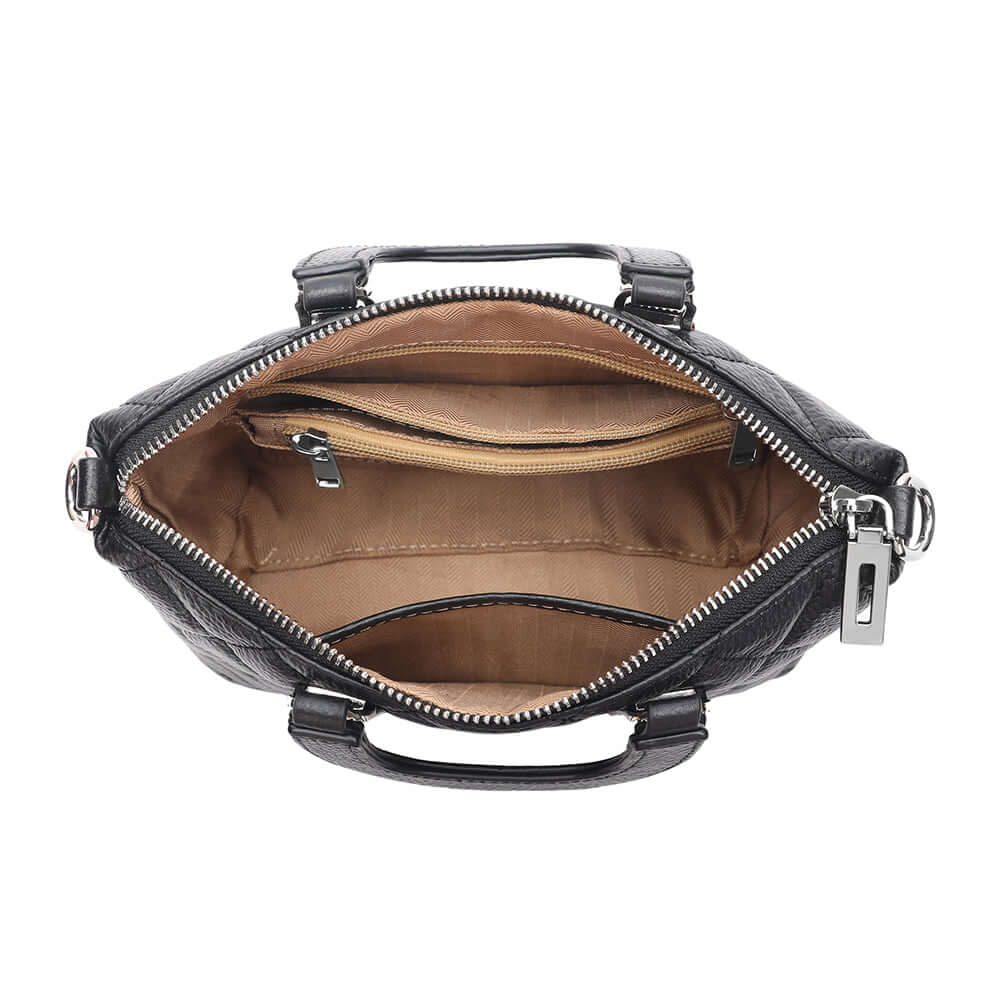 Top view showing inside compartments of mini leather bag