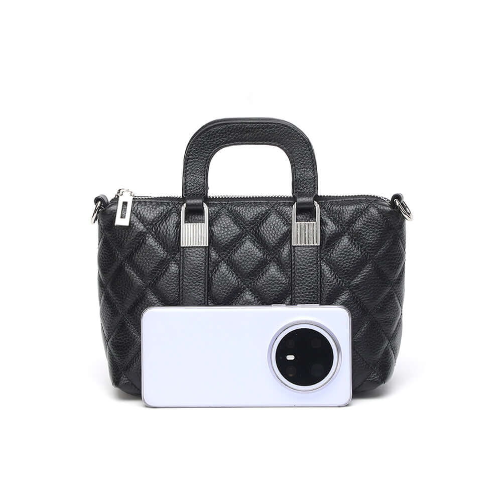 Size comparison of mini quilted handbag with phone