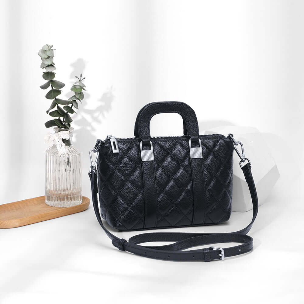 Mini leather handbag styled on table setup