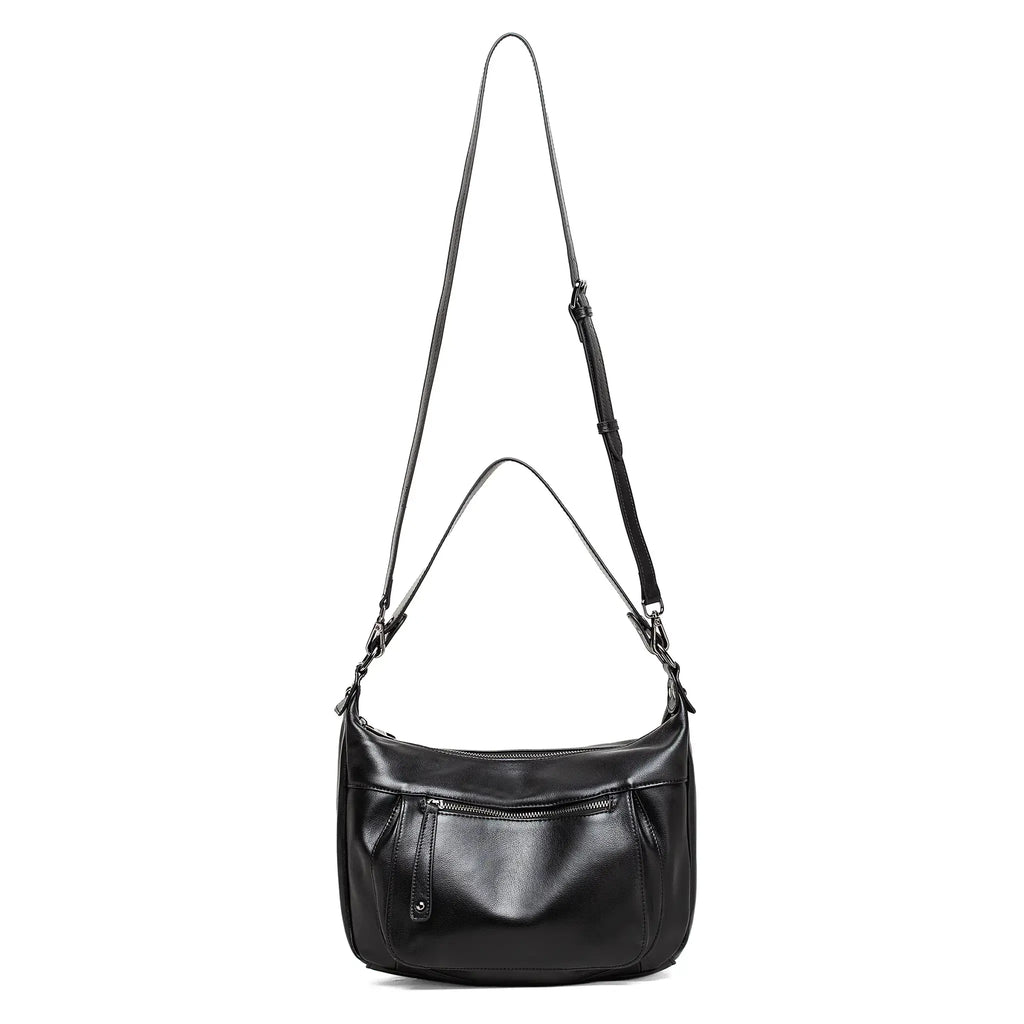 Minimalist leather handbag with multiple carry options