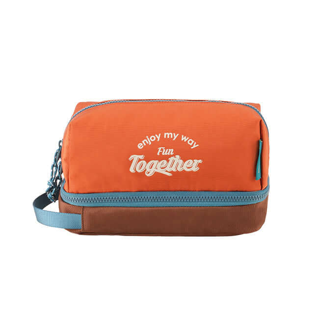 Orange travel toiletry bag perfect for organized trips.