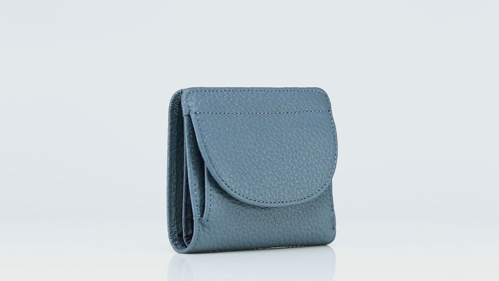 Stylish women's RFID leather wallet in blue, featuring foldable design and secure compartments.