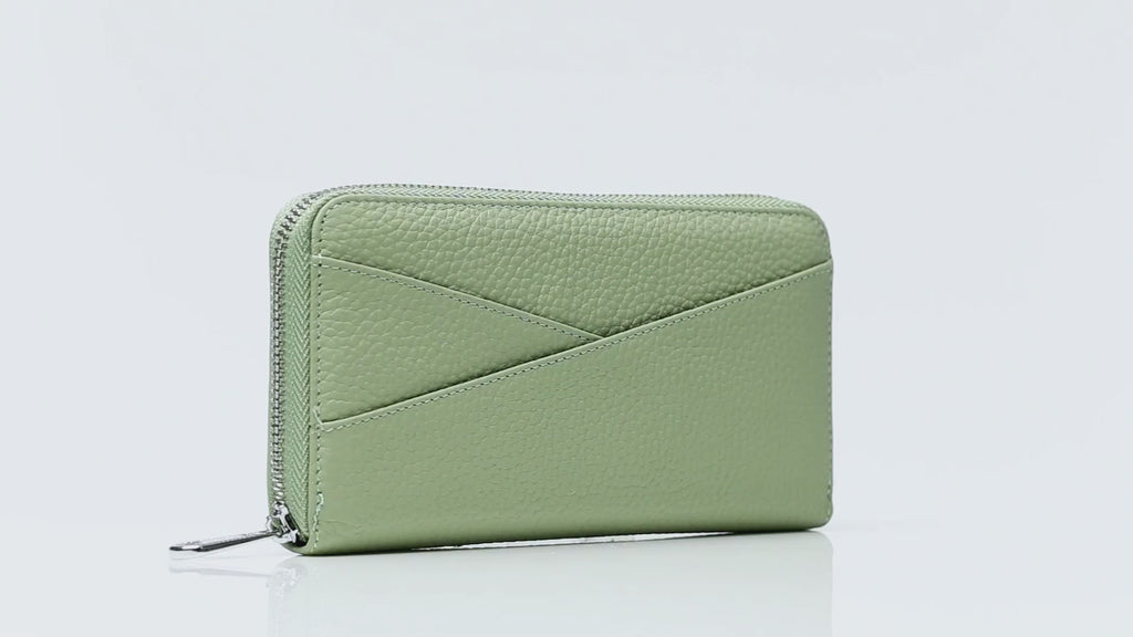 Zippered RFID leather wallet with card holder slots, money compartments, and secure closure.