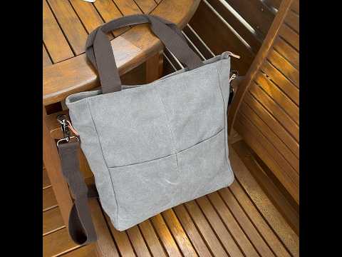 Grey canvas tote bag for women with a stylish and functional design.