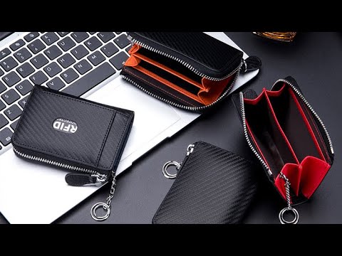 Men's carbon fiber leather RFID wallet with coin pocket.