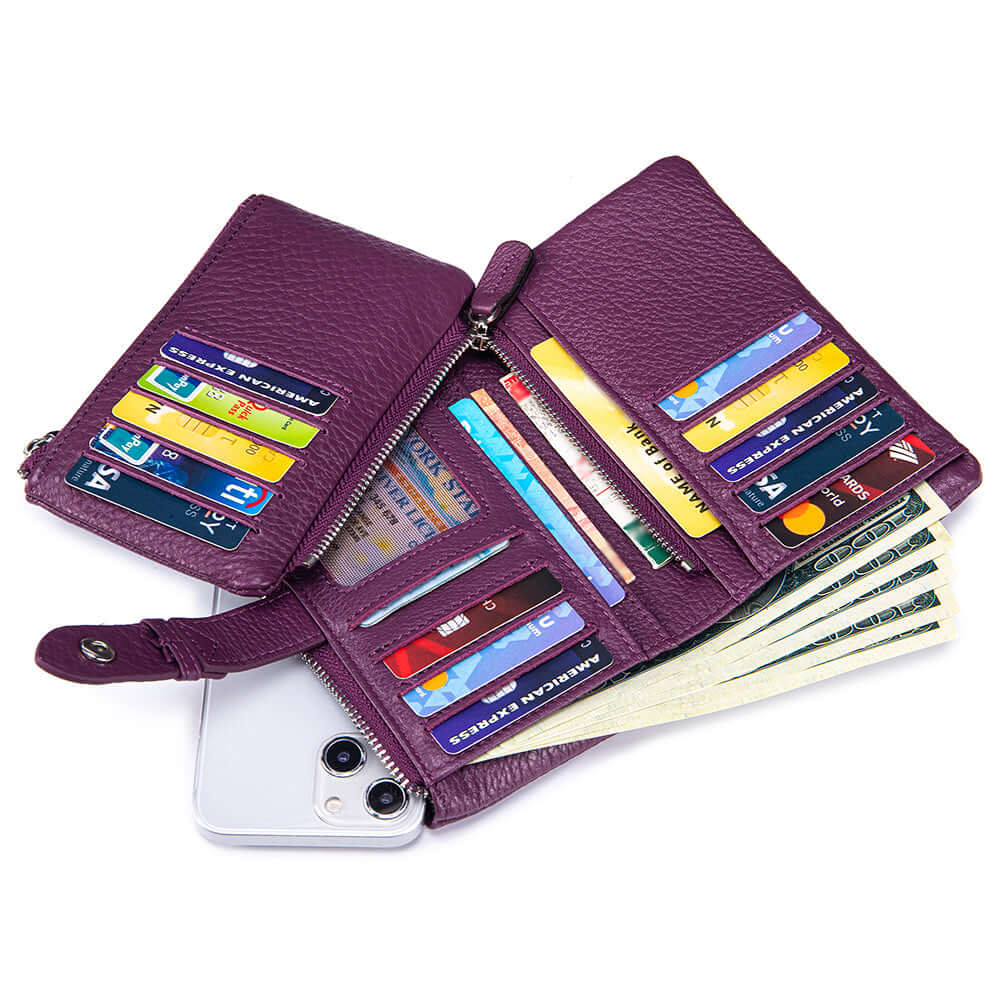 Purple wallet with various cards and money