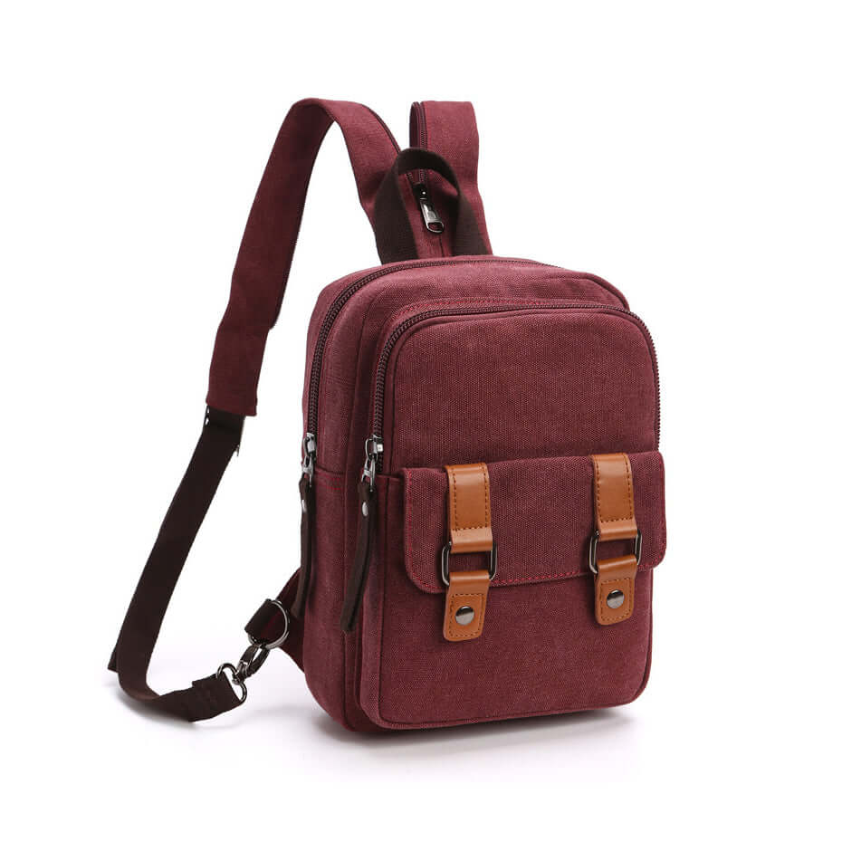 Red casual canvas backpack with leather buckle detail