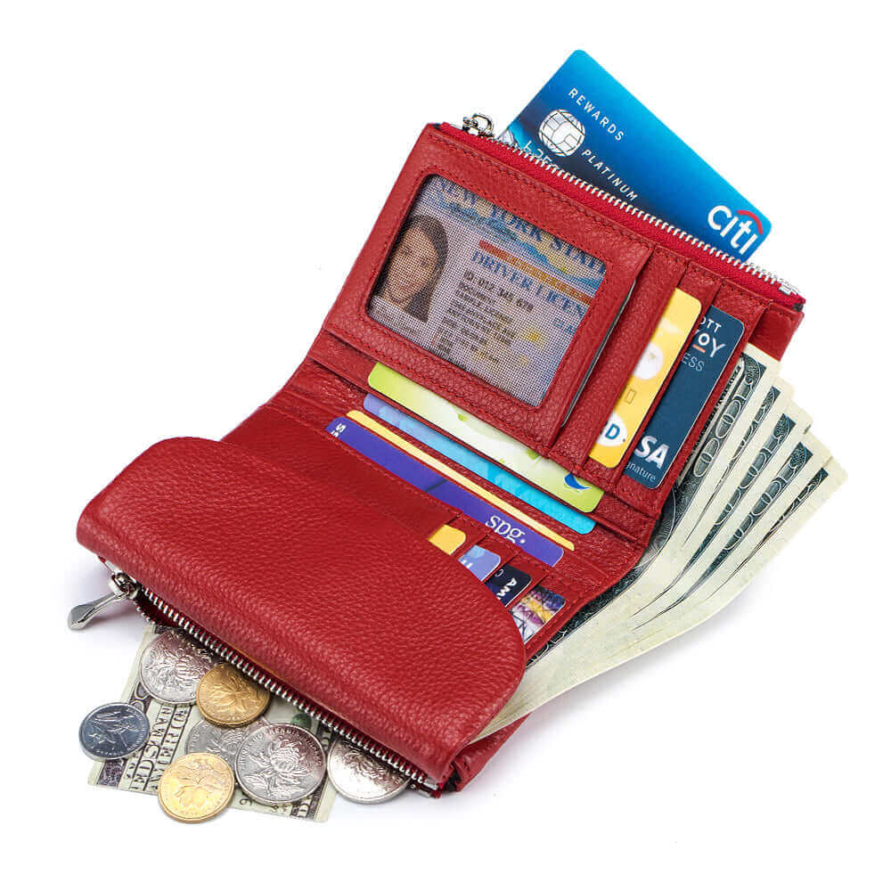 Red leather envelope wallet with coins and cash neatly organized.