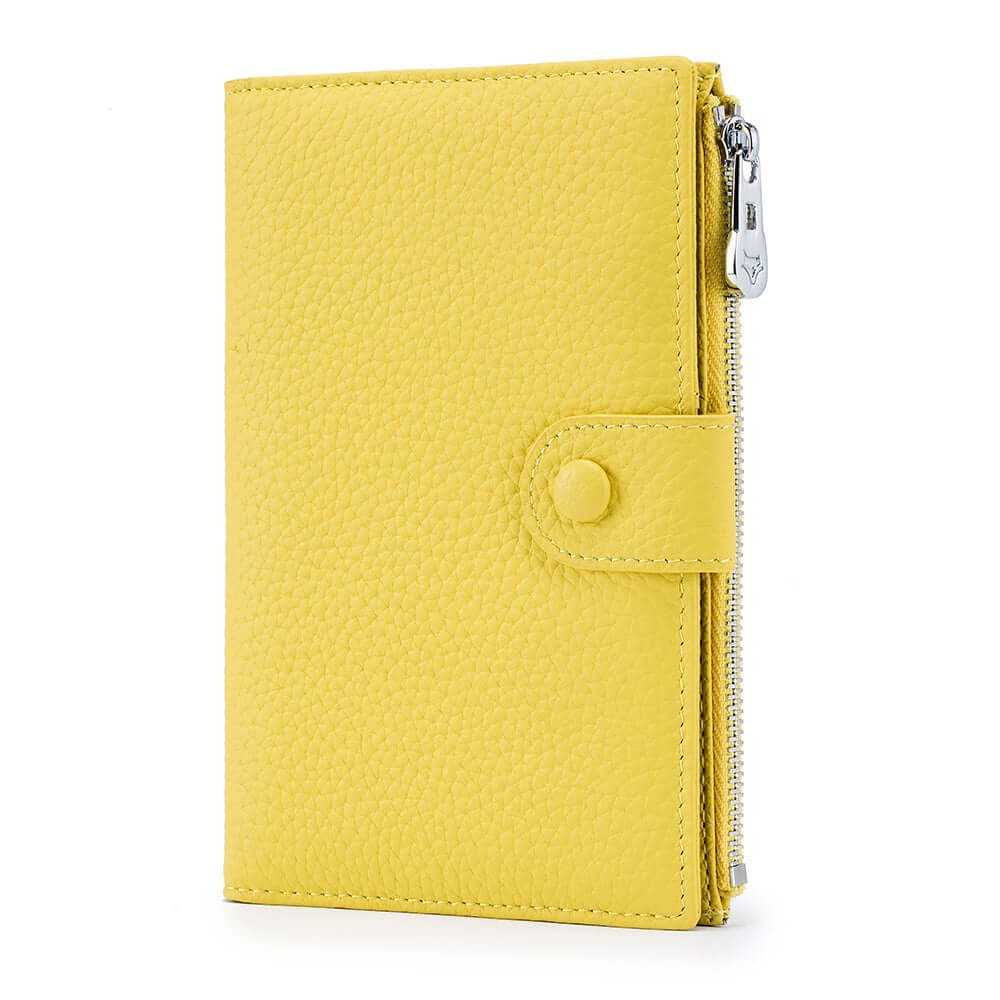 Yellow RFID-protected leather passport case with a secure zipper pocket.