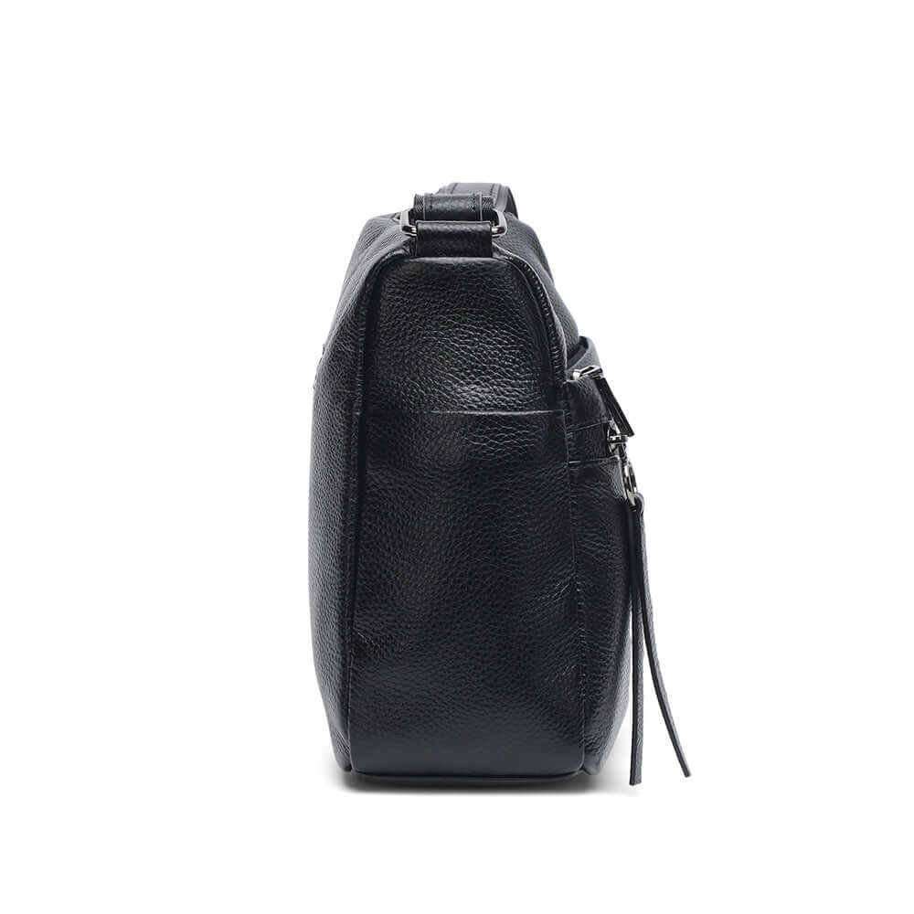 Side profile of black leather shoulder bag