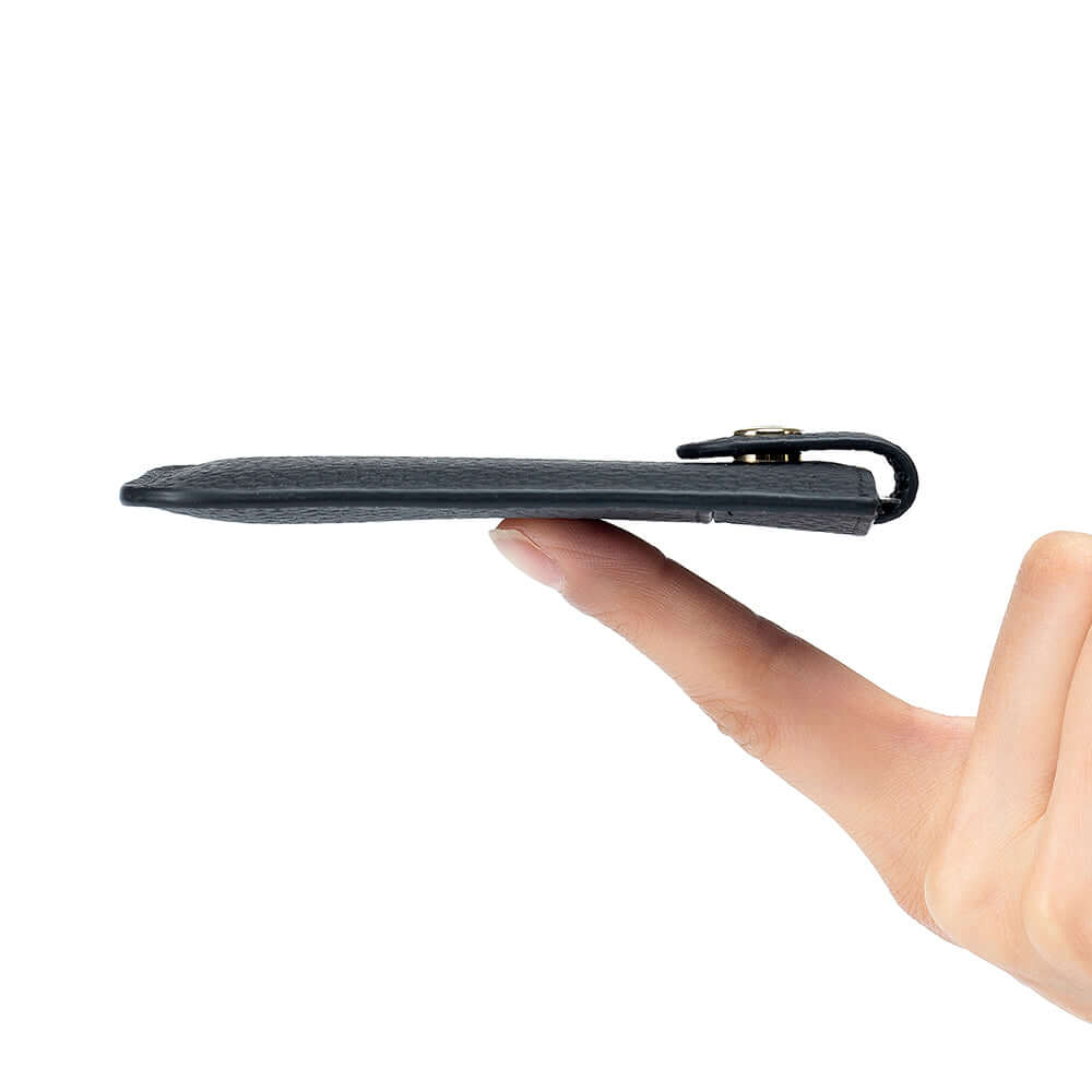 Ultra-thin side view showing minimalist leather wallet profile.