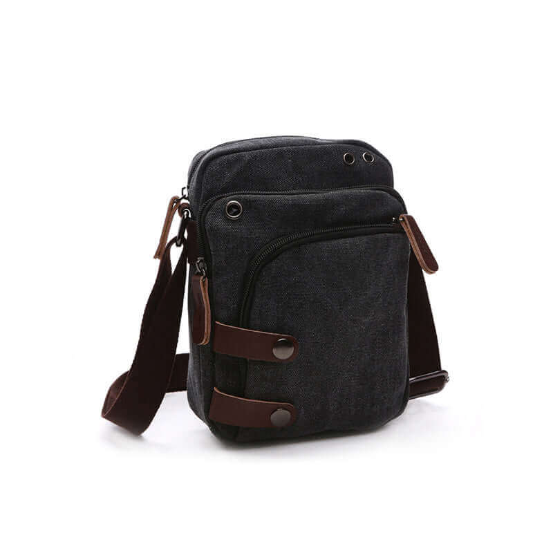 Small canvas crossbody bag for men with PU leather accents.