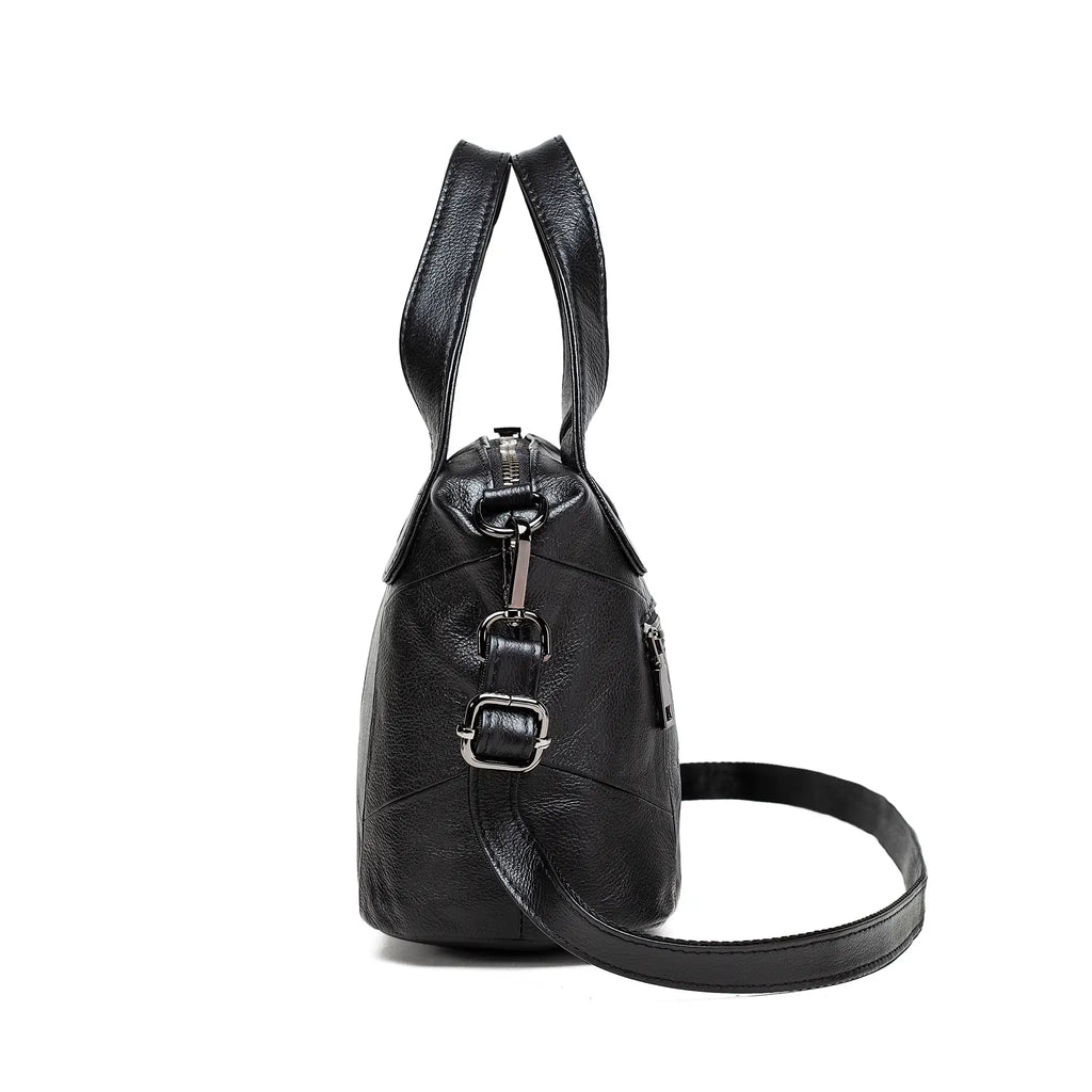 Side profile of women’s leather handbag
