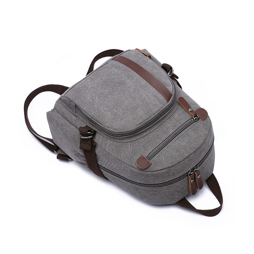 Small sling-style backpack in grey canvas