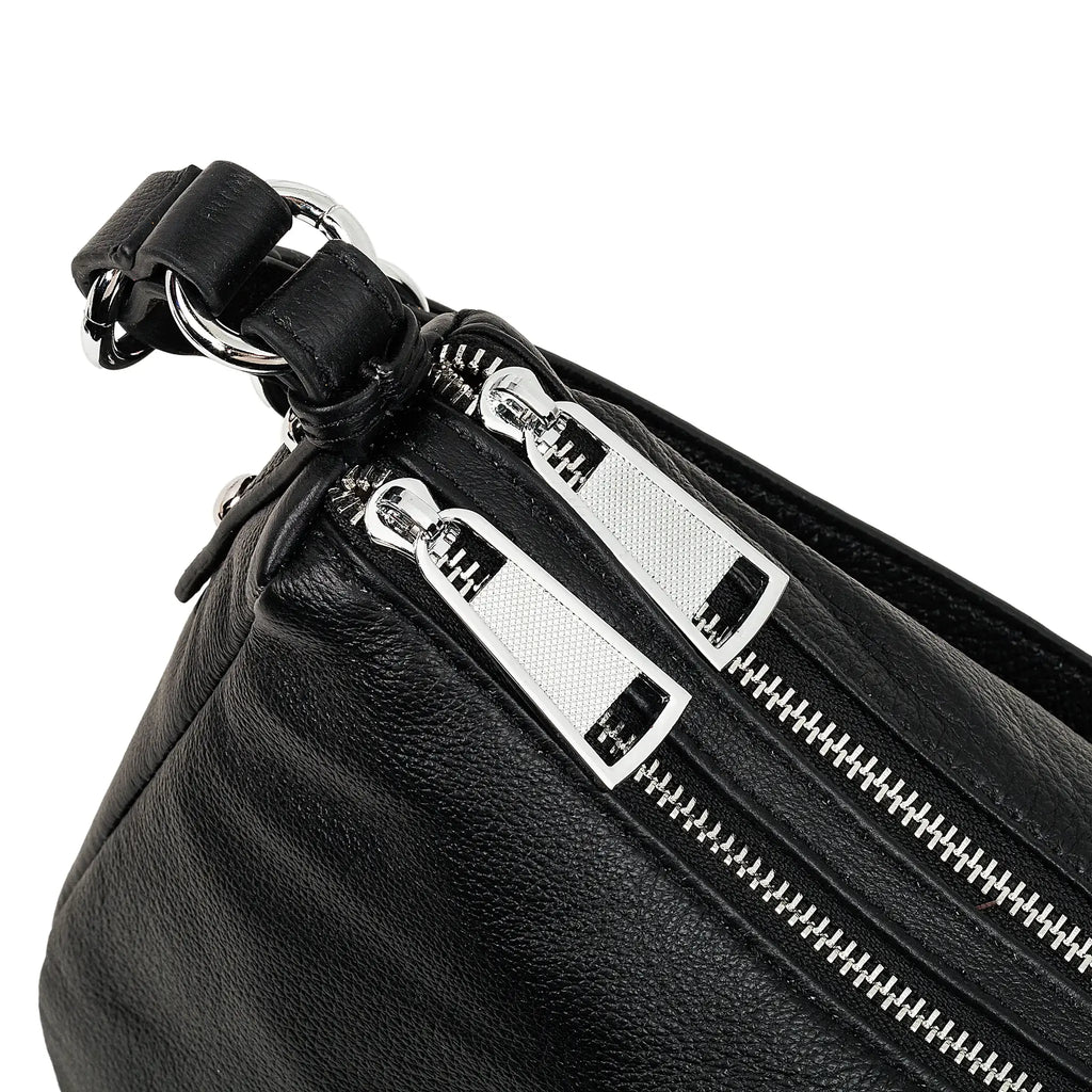 Top zipper compartment of genuine leather bag