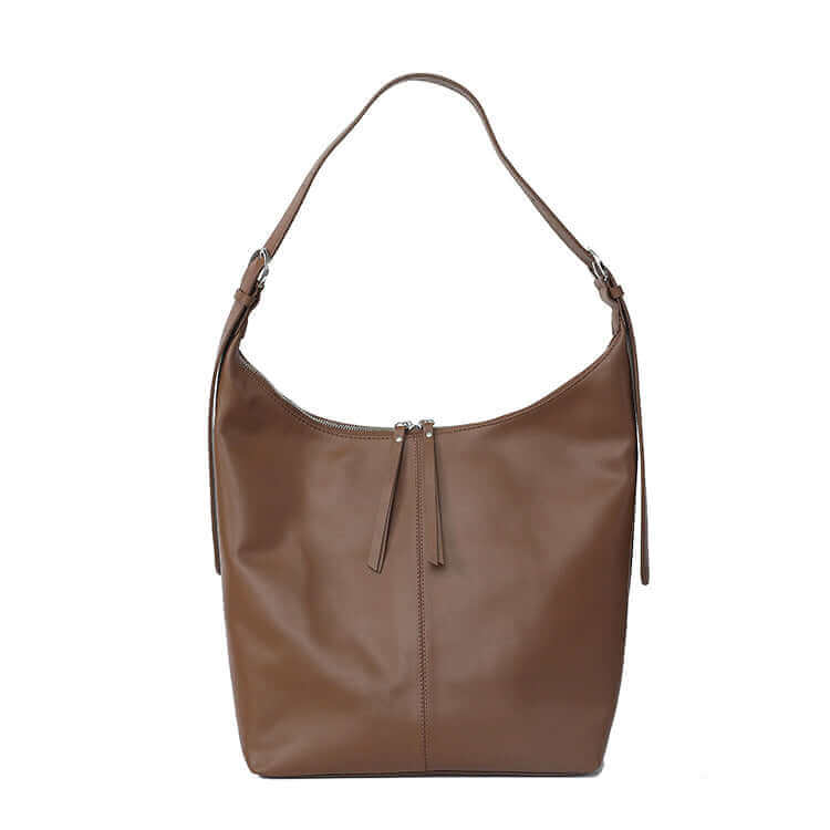 Front view of a spacious leather shoulder bag with soft genuine leather.