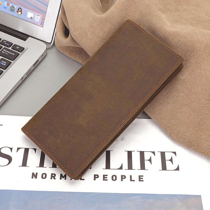 Sleek brown Crazy Horse leather wallet designed for men and women.