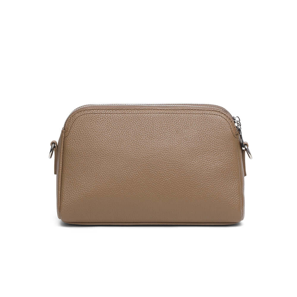 Back view of taupe genuine leather crossbody bag.