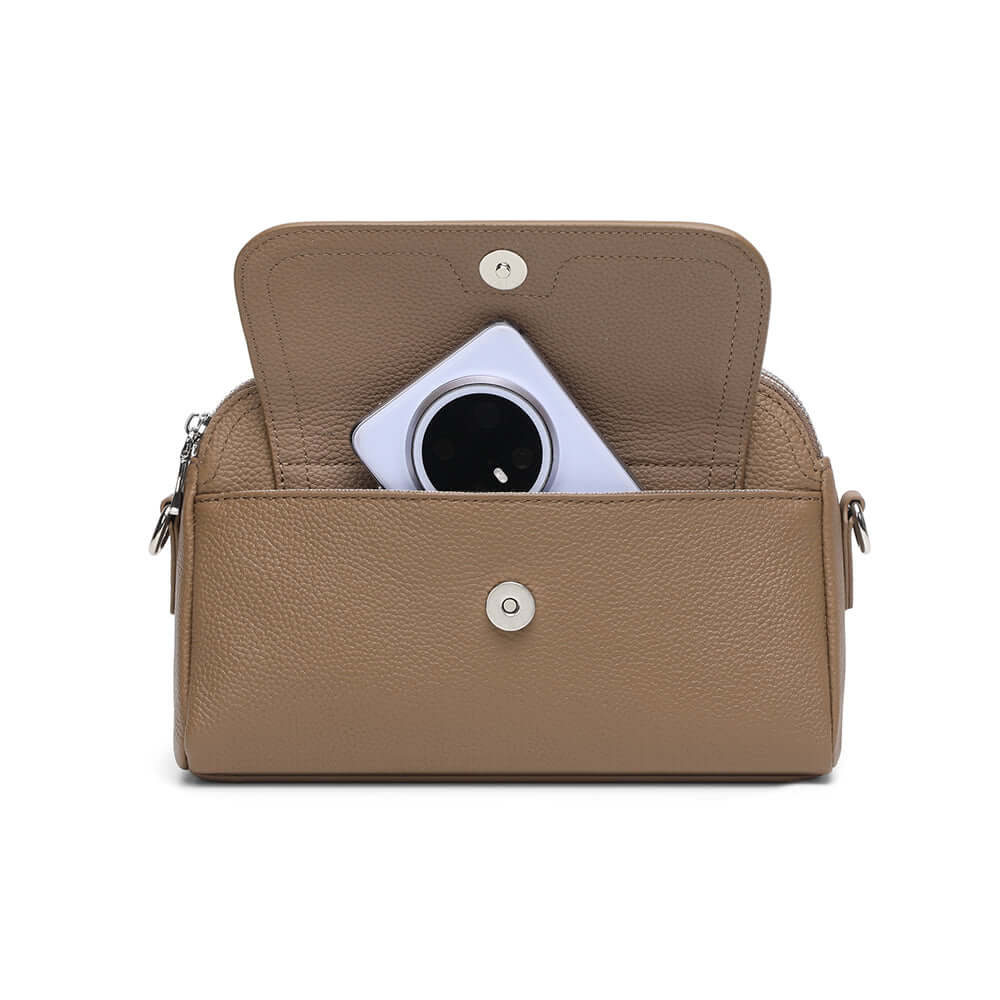 Front view of the taupe leather handbag.