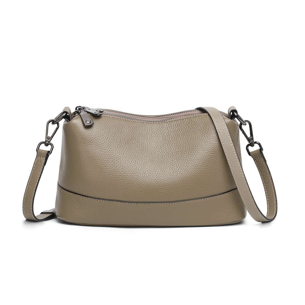 Front view of taupe leather crossbody bag.