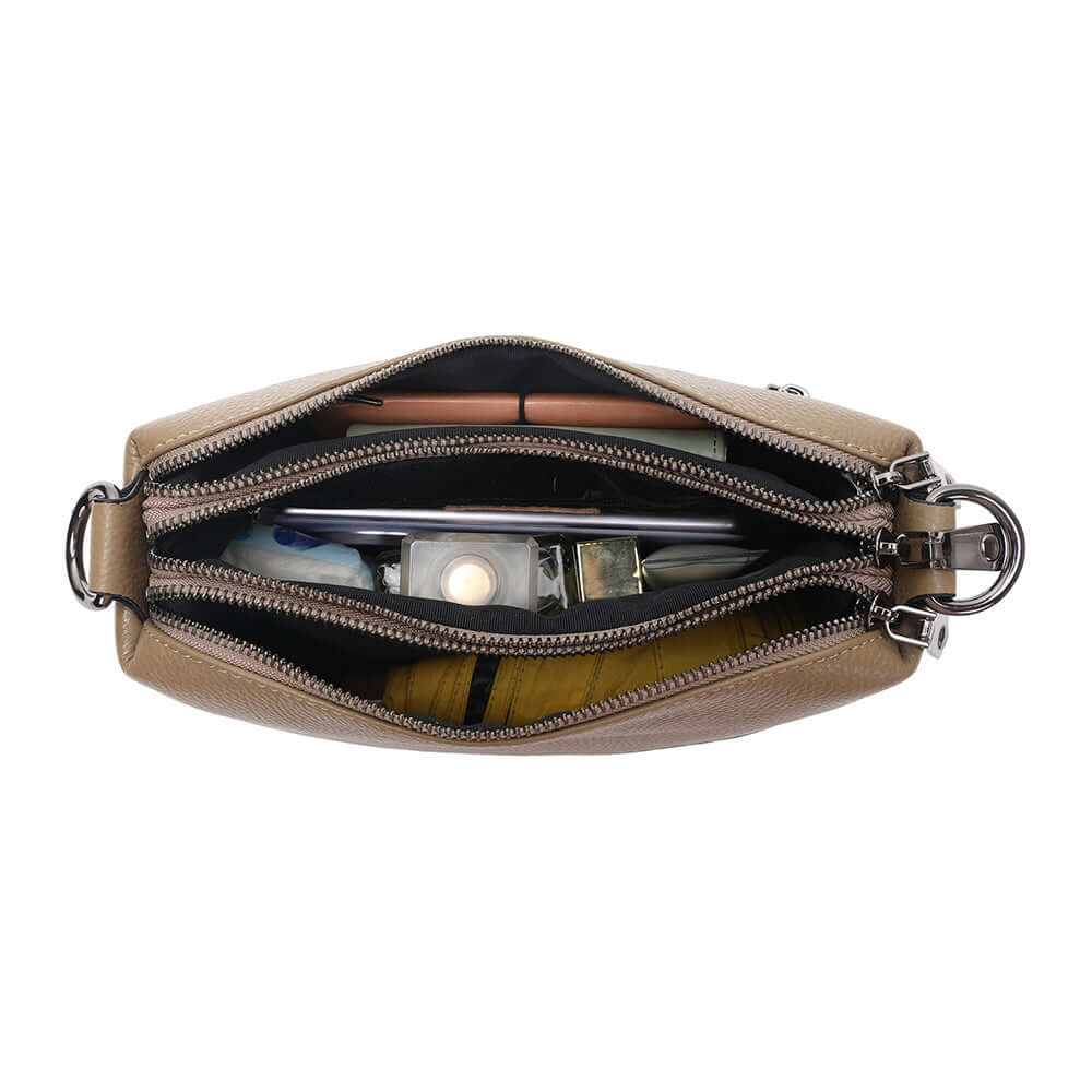 Interior of the taupe leather crossbody bag.