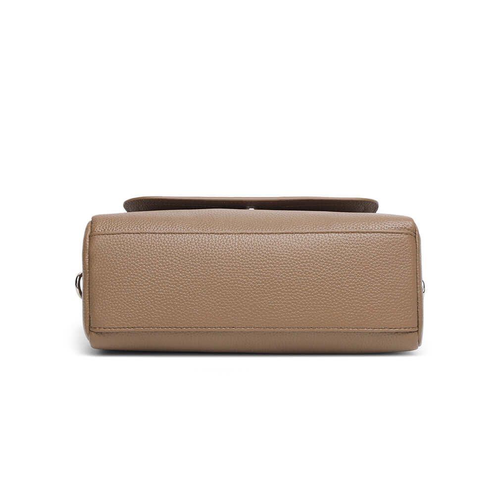 Bottom view of the taupe leather shoulder bag.