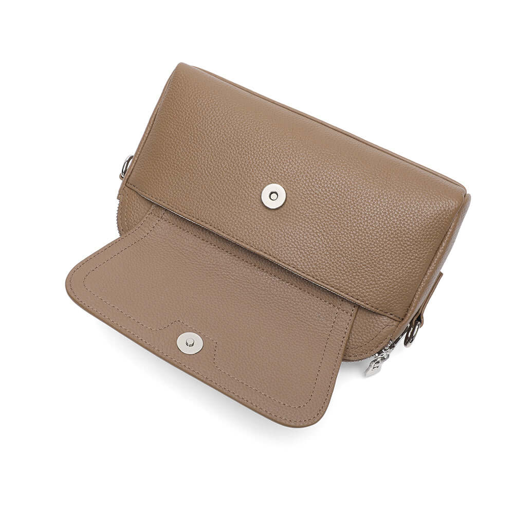 Open view of the taupe leather handbag.