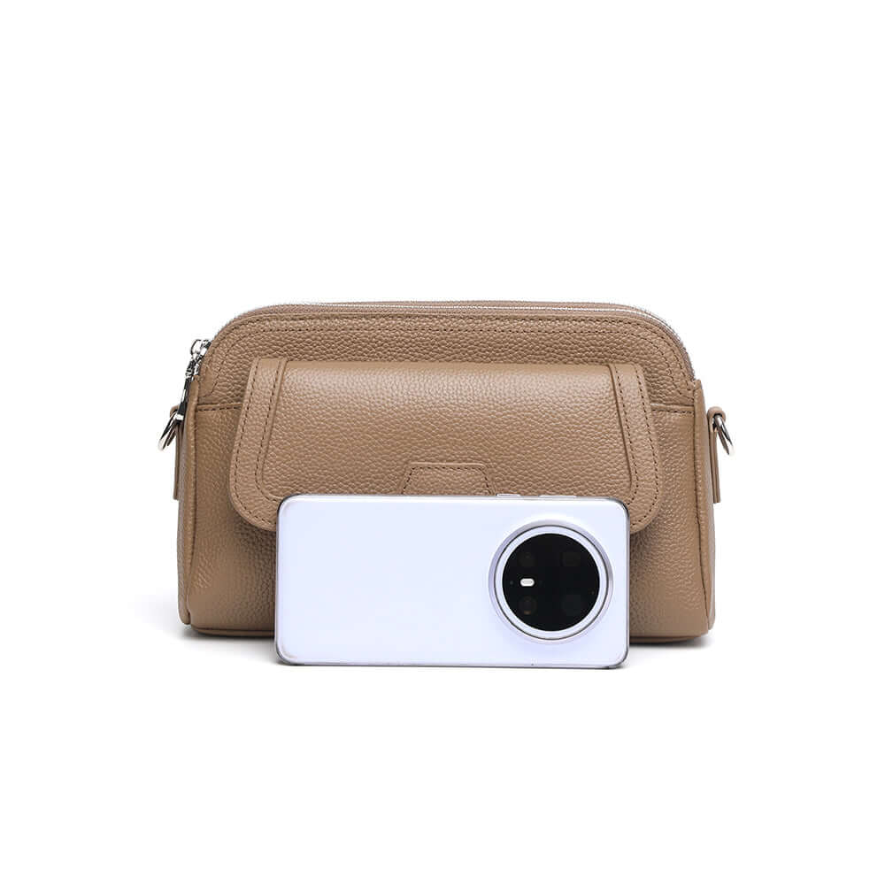 Size comparison of taupe leather bags.