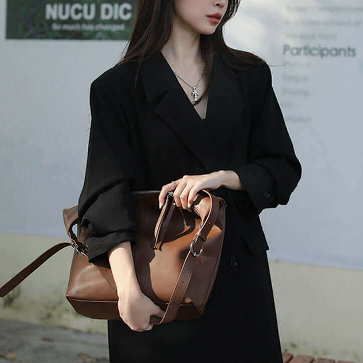 Fashion-forward leather bag complementing trendy NZ outfits.