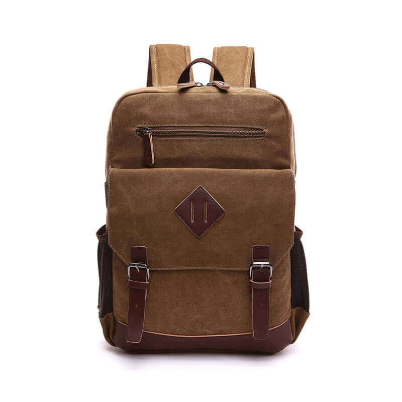 Unisex canvas backpack in coffee color with leather accents.