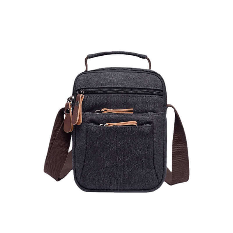 Unisex canvas shoulder bag featuring multiple zippered pockets for easy organization.