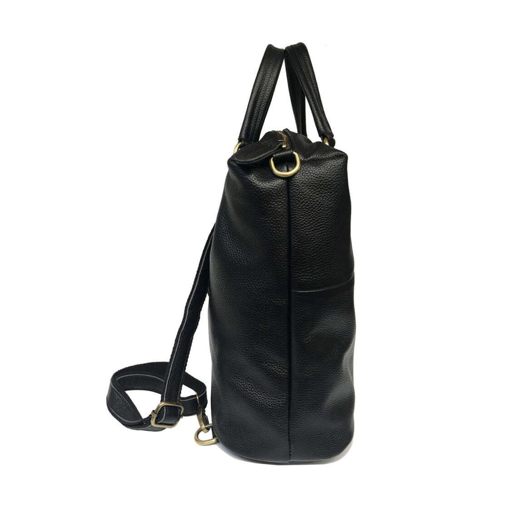 Multi-functional women's black leather backpack with multiple carrying options.