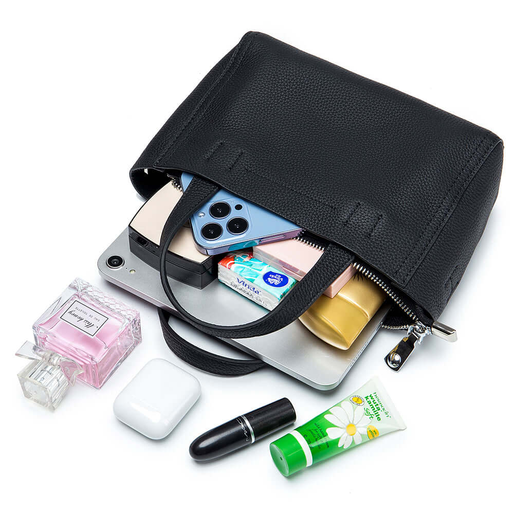 Compact leather mini handbag displayed with daily essentials – phone, wallet, and makeup.