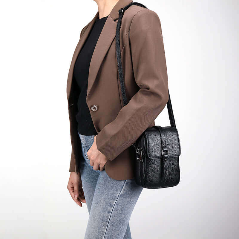 Vertical crossbody bag with sleek design.