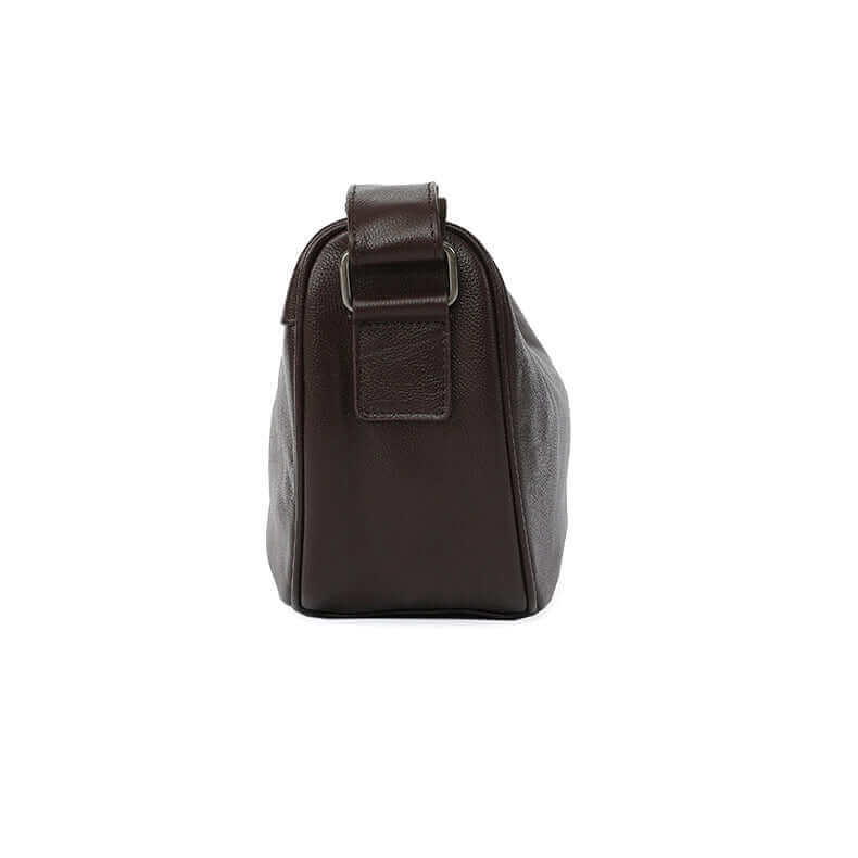 Side view of vintage genuine leather crossbody bag with a chic and minimalist design.