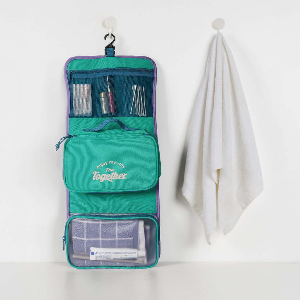 Waterproof hanging toiletry bag with multiple compartments