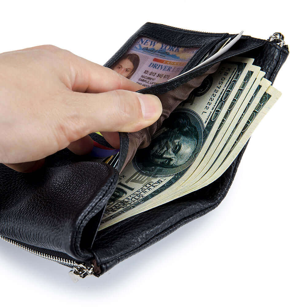 Interior view of a women's black leather wallet.