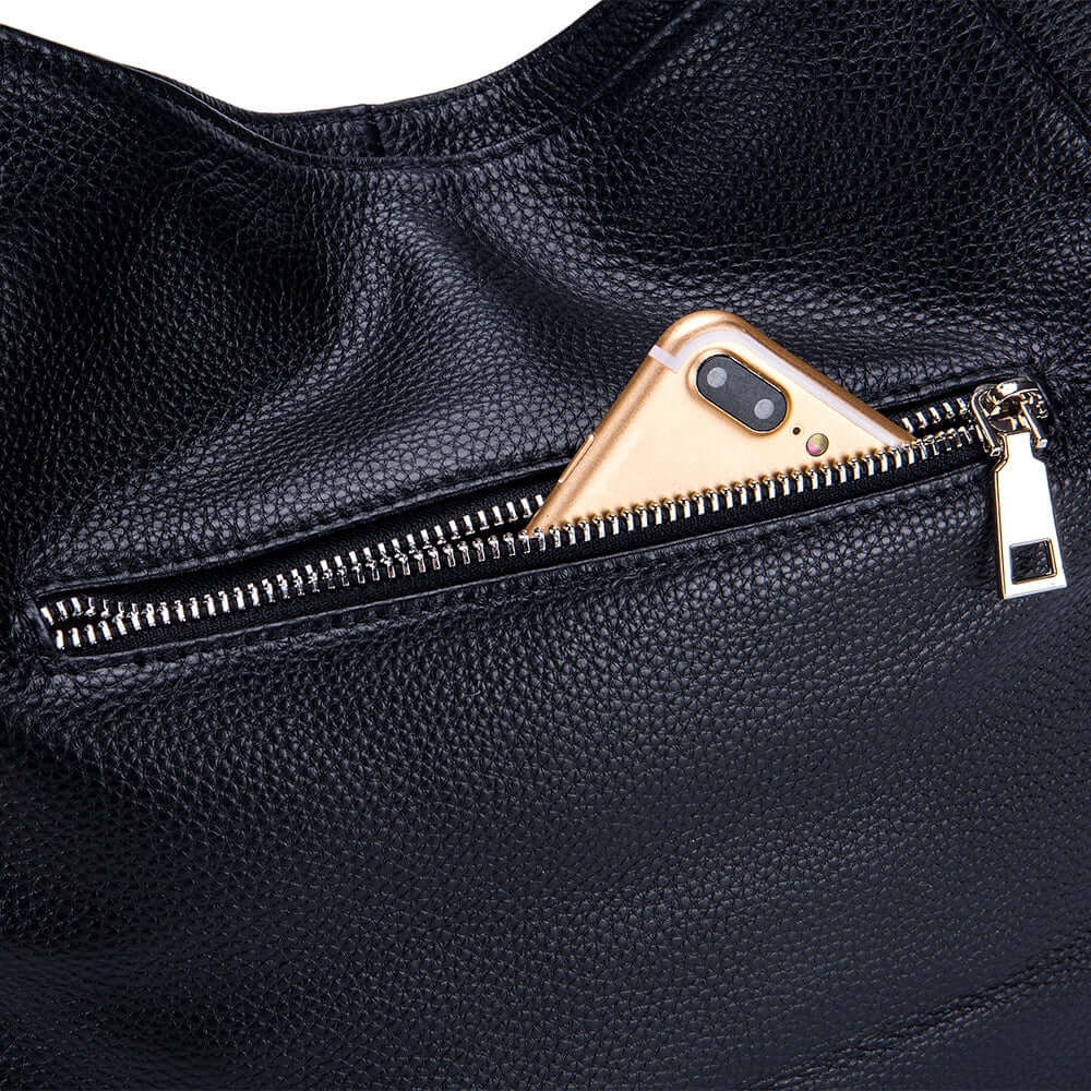 Details of the back of the black genuine leather shoulder bag.