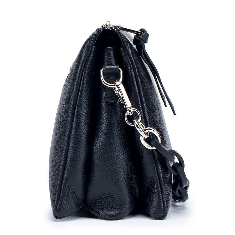 Side view of the women's leather shoulder bag.