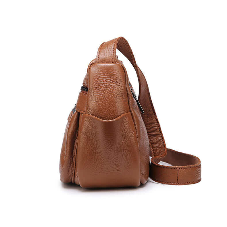 Side view of the women's leather crossbody bag.