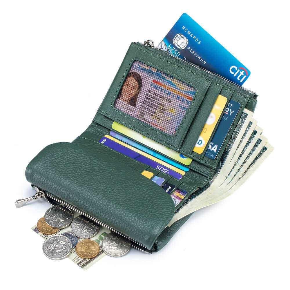 Open view of the women's leather envelope wallet displaying its contents.