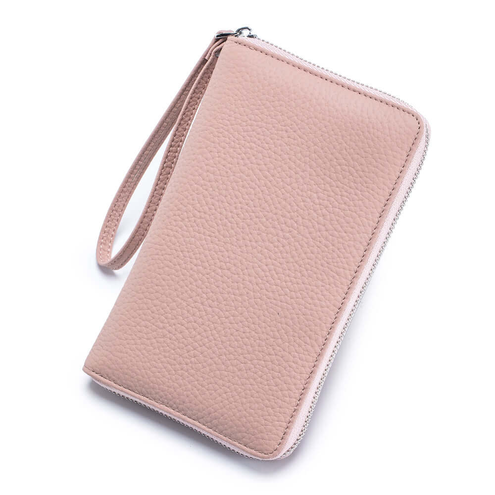 Women's leather passport wallet in pink.