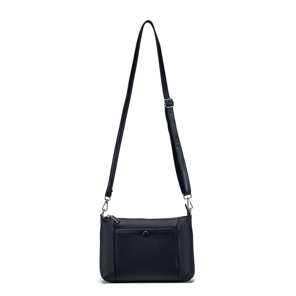 Women's black leather crossbody bag front view showcasing stylish and compact design.